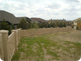 Colored and Textured Concrete Fence Wall